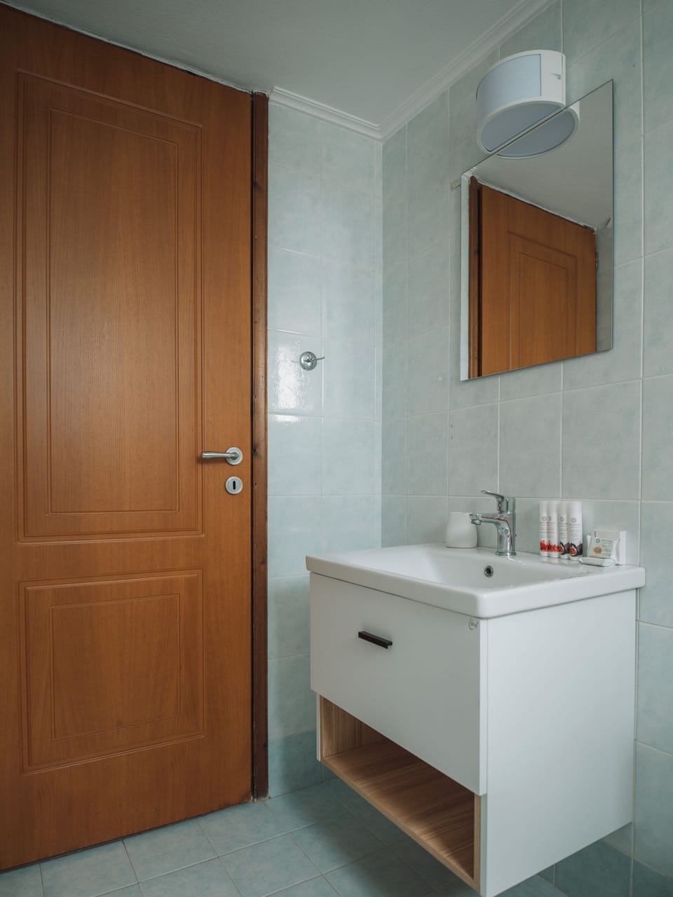 Shower, designer toiletries, hair dryer, slippers