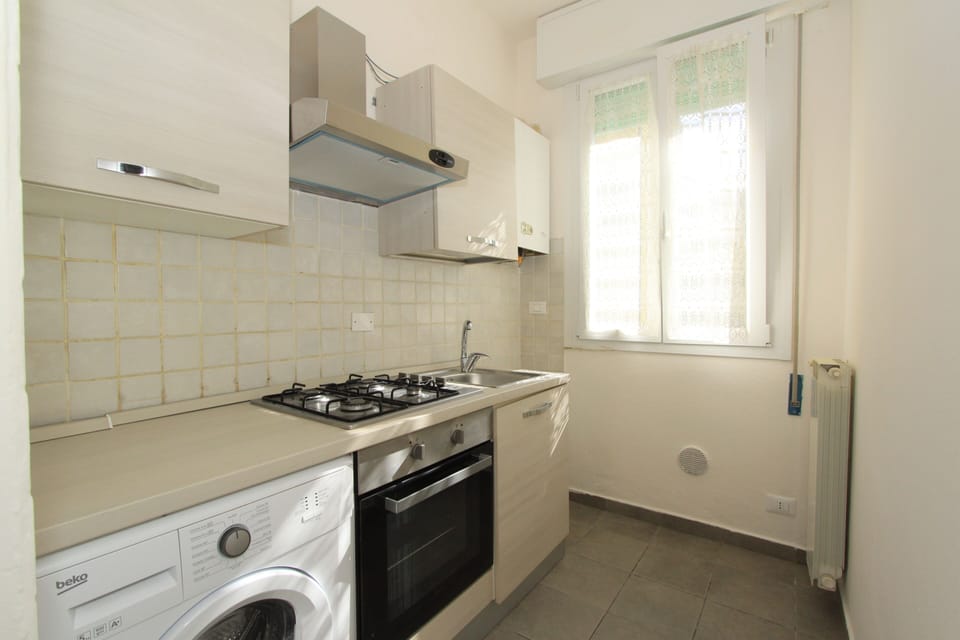 Classic Apartment, 2 Bedrooms | Private kitchen | Full-size fridge, oven, stovetop, cookware/dishes/utensils