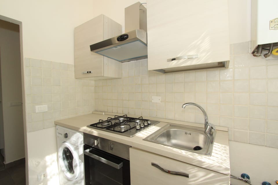 Classic Apartment, 2 Bedrooms | Private kitchen | Full-size fridge, oven, stovetop, cookware/dishes/utensils