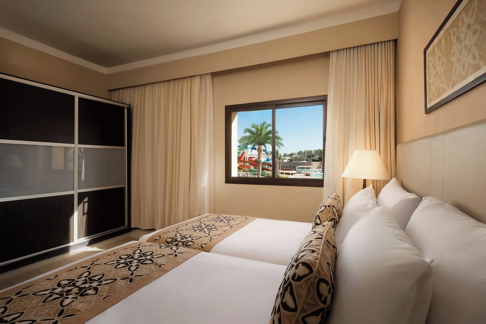 Junior Suite | Minibar, in-room safe, individually furnished, free cribs/infant beds
