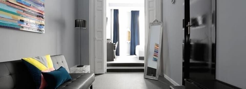 Suite (2 Adults + 2 Children) | Living area | Flat-screen TV, fireplace
