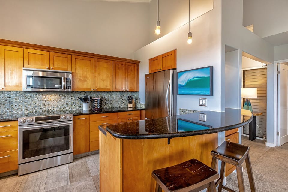 Spacious island with seating for two. 