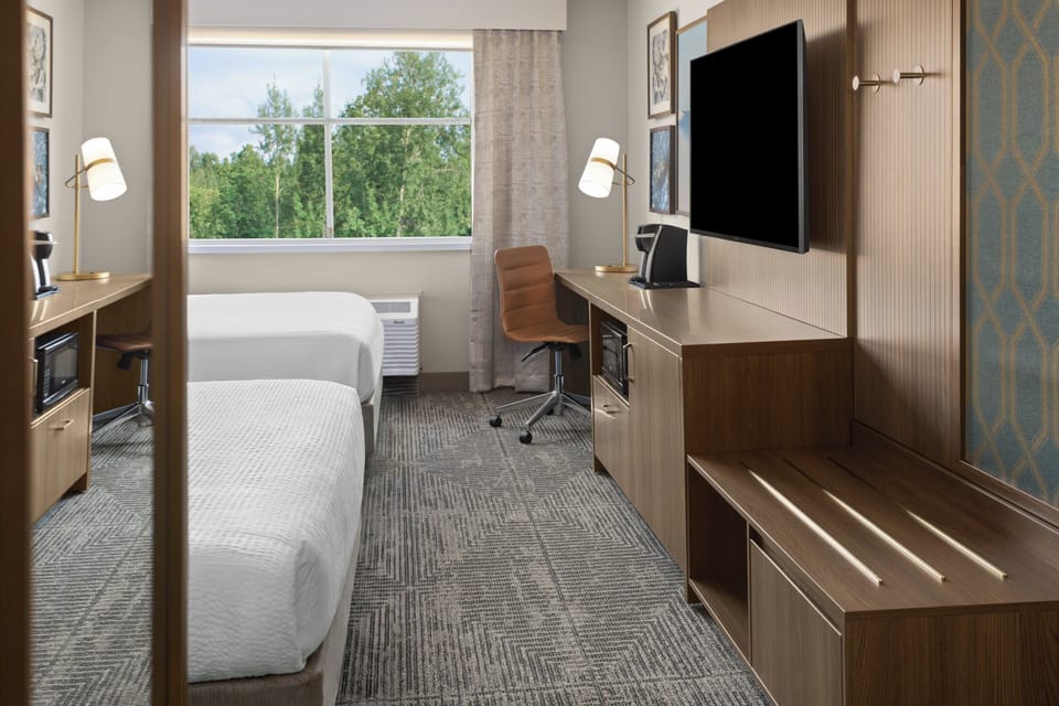 Premium bedding, pillowtop beds, desk, blackout drapes