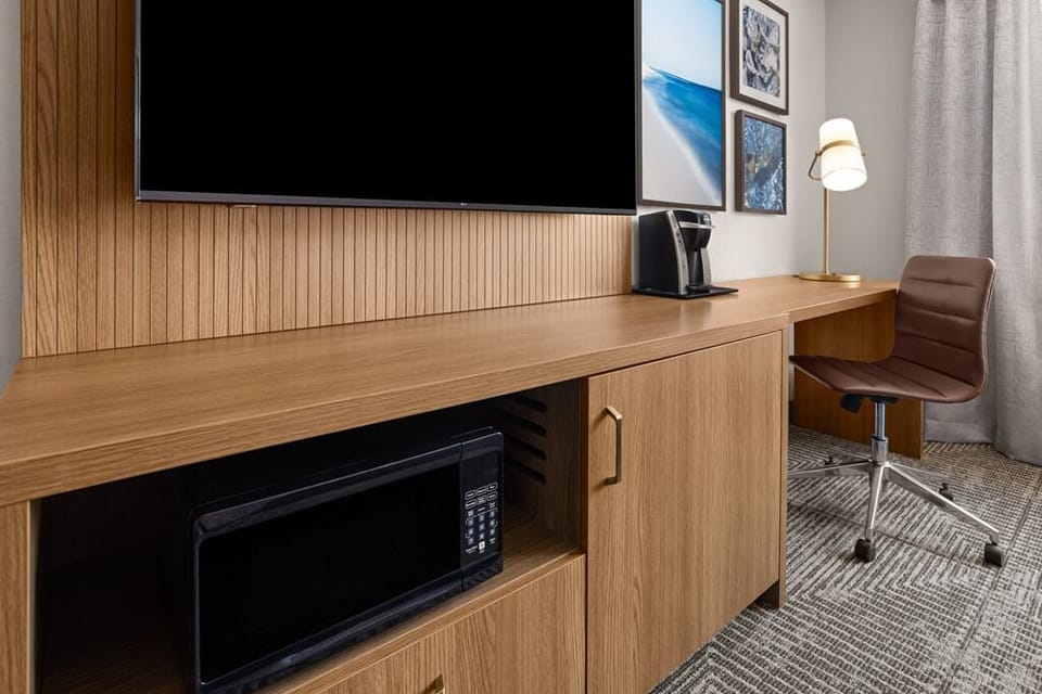 55-inch flat-screen TV with cable channels, TV
