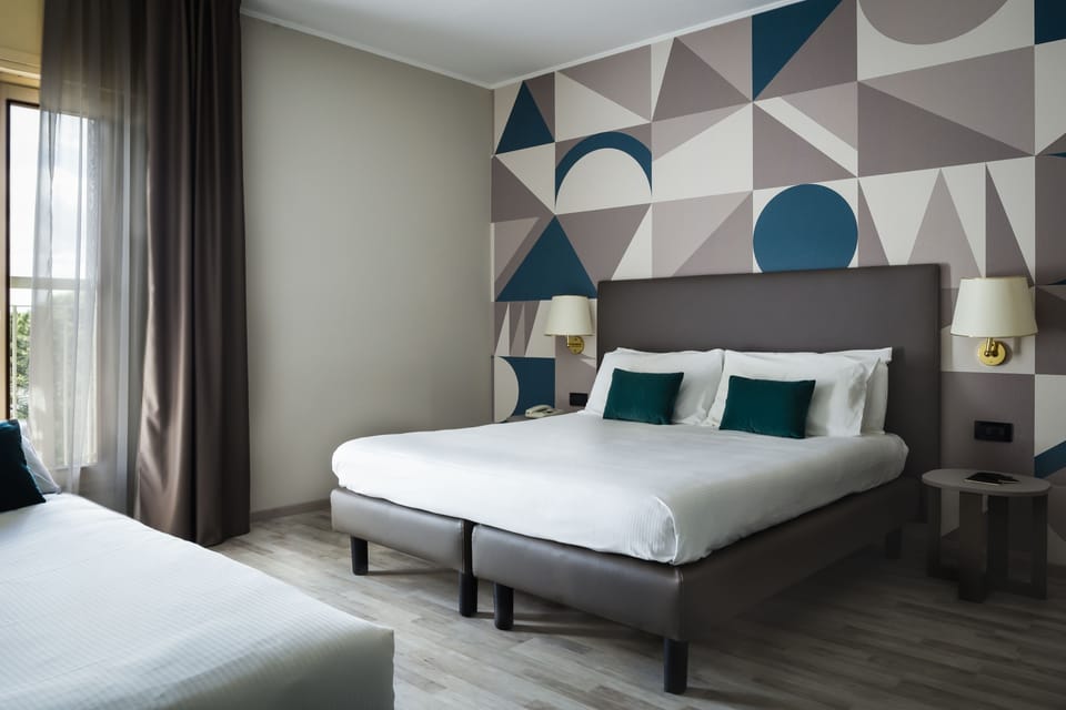 Superior Triple Room | 1 bedroom, desk, blackout drapes, iron/ironing board