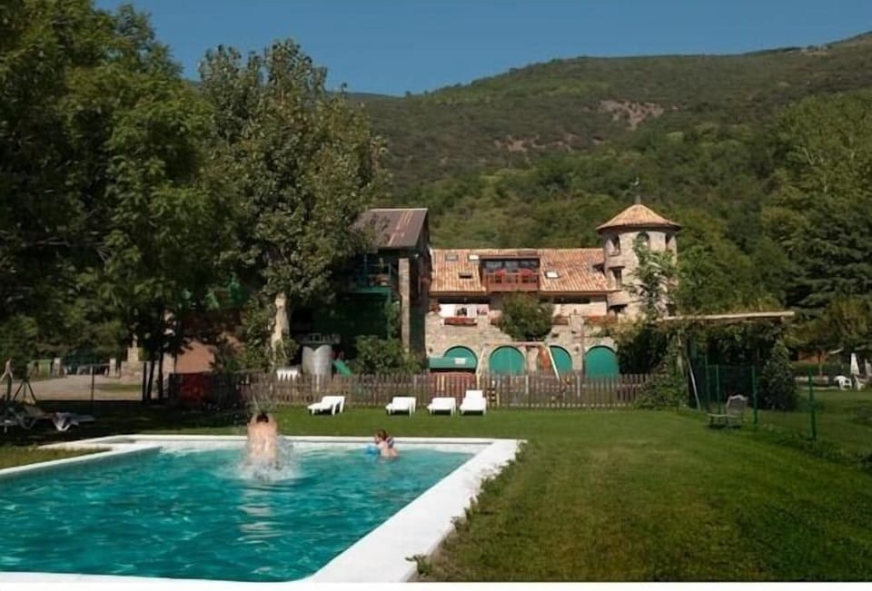 Seasonal outdoor pool, open 10 AM to 8 PM, pool umbrellas, sun loungers