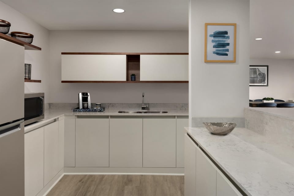 Suite, 1 King Bed, Kitchen | Private kitchen | Fridge, microwave, coffee/tea maker