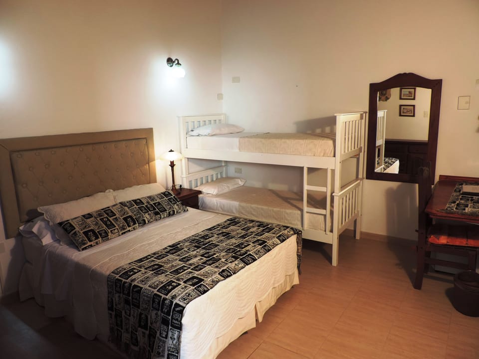 Standard Quadruple Room | In-room safe, blackout drapes, free WiFi, bed sheets