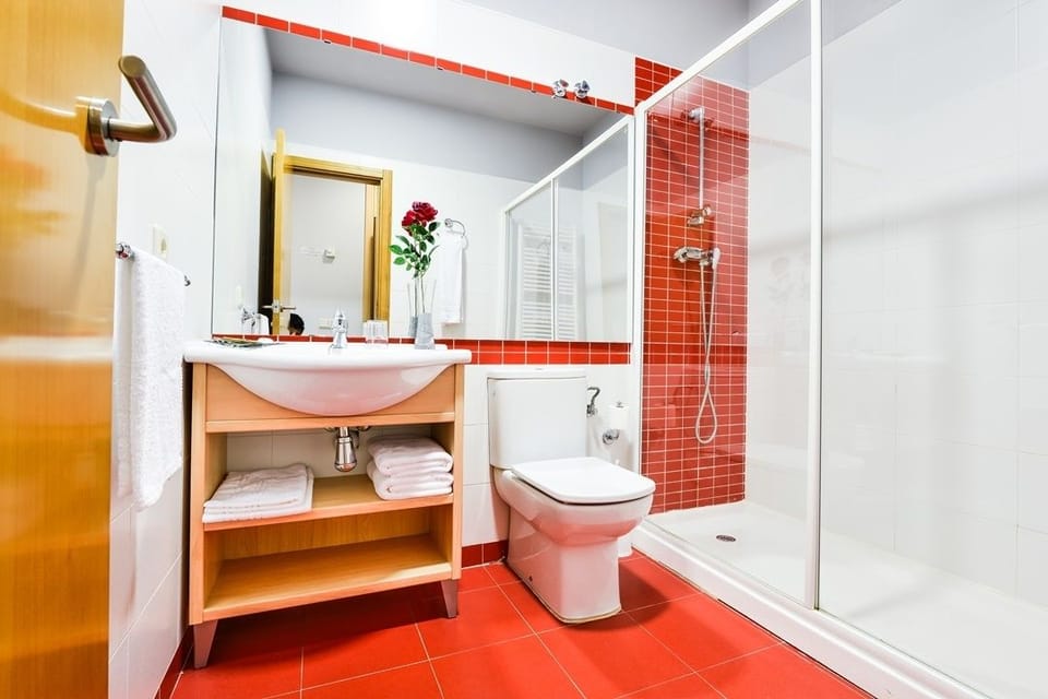 Shower, free toiletries, hair dryer, towels