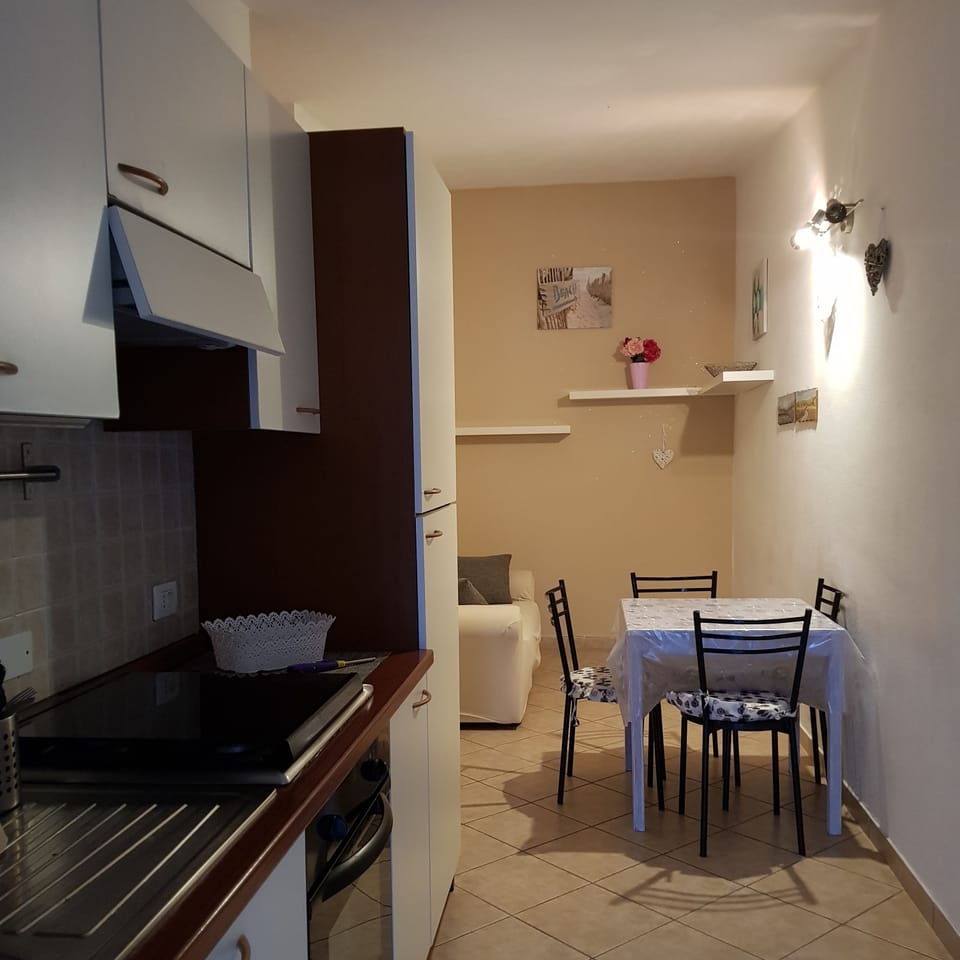 Apartment, 2 Bedrooms | Living room | Flat-screen TV