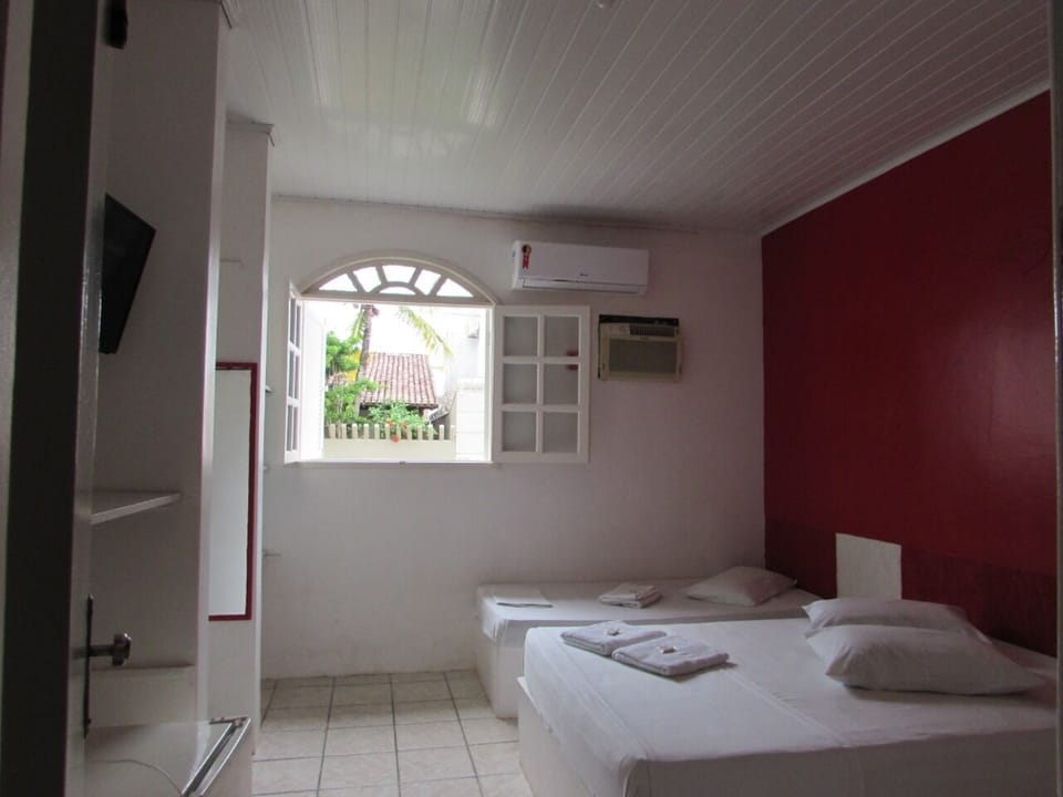 Triple Room | Minibar, iron/ironing board, free WiFi, bed sheets