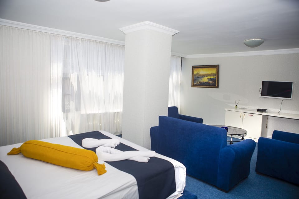 Deluxe Double Room, City View | Premium bedding, minibar, in-room safe, desk