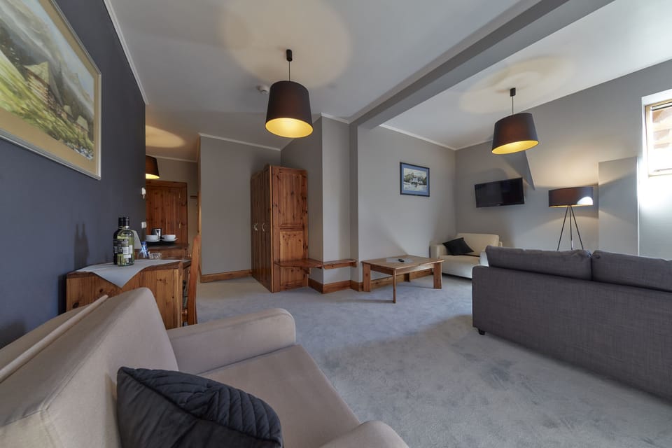 Suite, 1 Queen Bed, Balcony | In-room safe, desk, iron/ironing board (on request), WiFi (free)