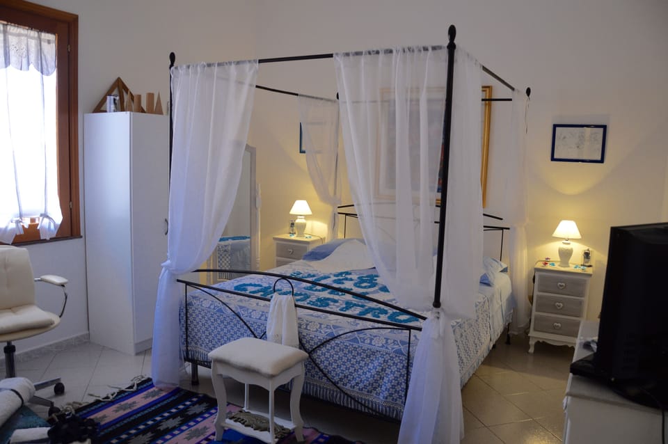 Standard Room, 1 Bedroom, Non Smoking, Courtyard Area (Cavalleria Rusticana) | Frette Italian sheets, premium bedding, minibar, individually decorated