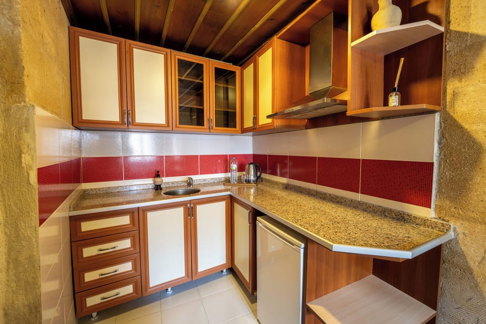 Traditional Suite, 2 Bedrooms | Private kitchen | Electric kettle, highchair