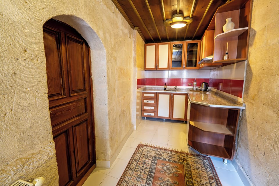 Traditional Suite, 2 Bedrooms | Private kitchen | Electric kettle, highchair