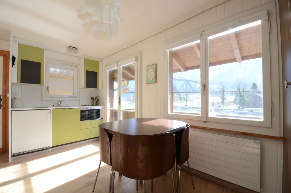 Dining leading on balcony.