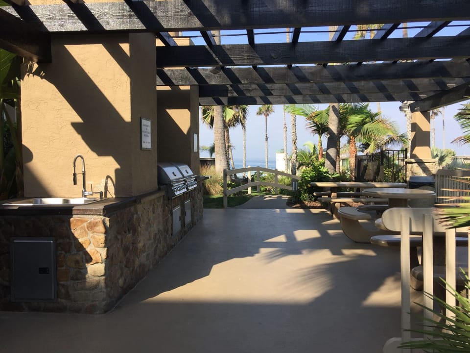 The BBQ area near the pool