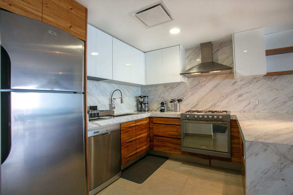 Renewed kitchen with marble countertops