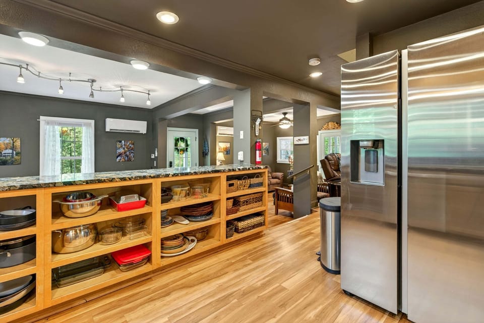 Extremely well-stocked kitchen with stainless steel appliances, a dishwasher, and two drip-style coffeemakers.