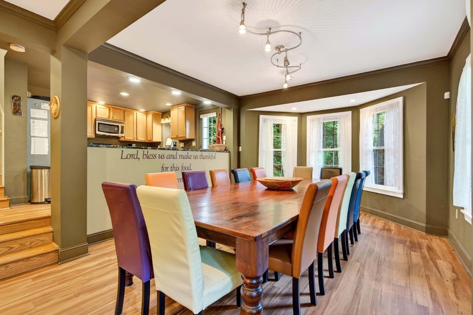 A large dining table with ample seating makes it easy to enjoy meals and fellowship.