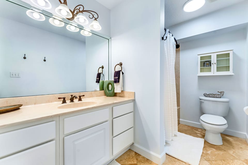 Attached bath with shower/tub combo