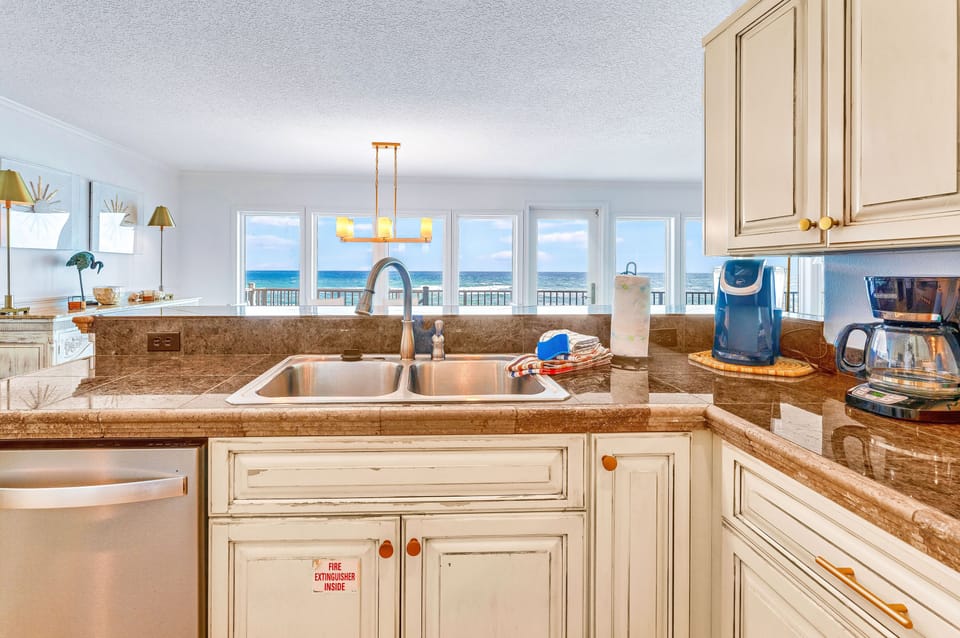 Gulf views form the kitchen, dining, and living room areas