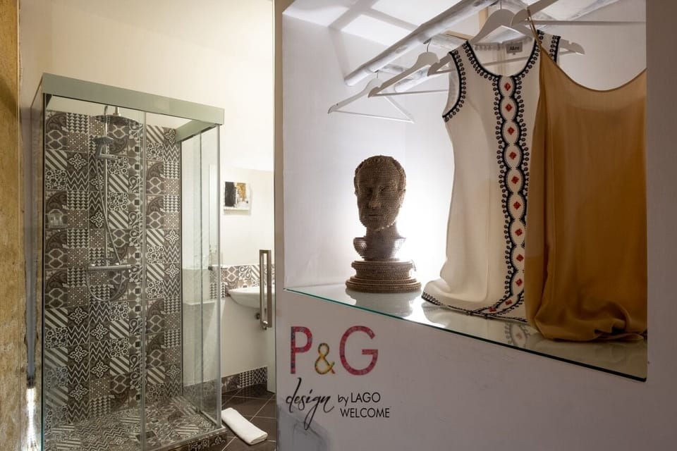 Luxury Double Room (Roccia) | Bathroom | Shower, deep soaking tub, rainfall showerhead, designer toiletries