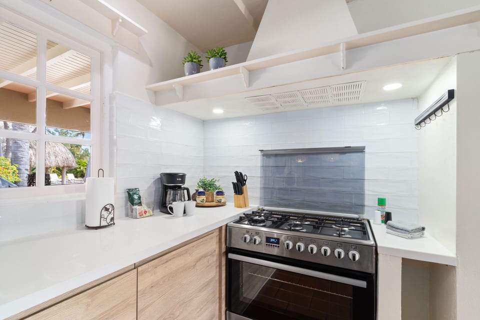 Enjoy the convenience and elegance of our fully furnished, modern kitchen