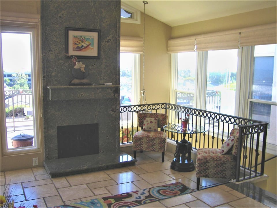 Upstairs fireplace and seating area