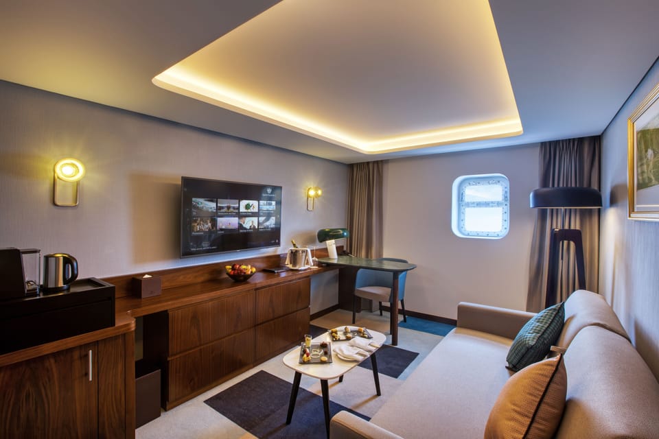 Suite, 1 Double Bed with Sofa bed (Officer) | Living area | 49-inch flat-screen TV with satellite channels, TV