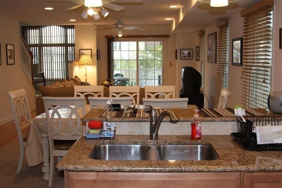 Living Room, sitting area under the balcony window, view from the kitchen