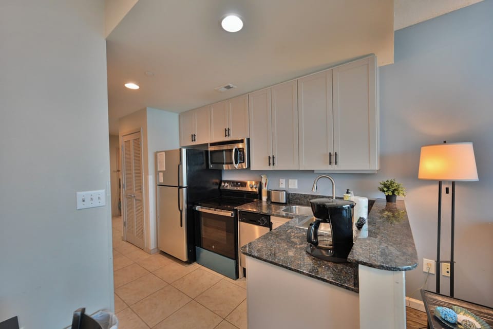 Modern Kitchen Designed for Comfort and Function with Granite Accents