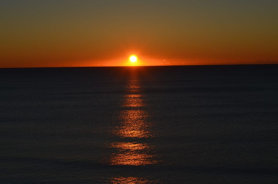 Romantic sunset over the peaceful horizon