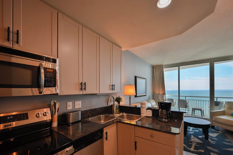 Bright, Fully Equipped Kitchen Perfect for Home-Cooked Meals