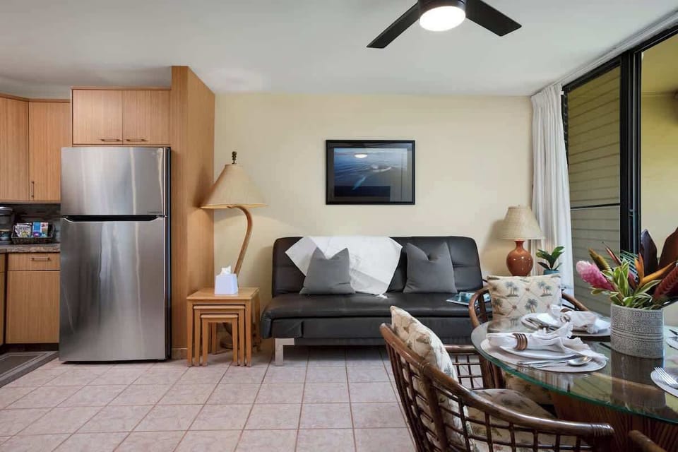 Dining area with 4 chairs and futon sofa in the living room!