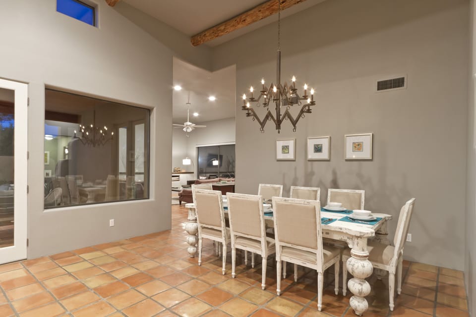 Dining Room - Dining room features a large dining table for eight and beautiful chandelier