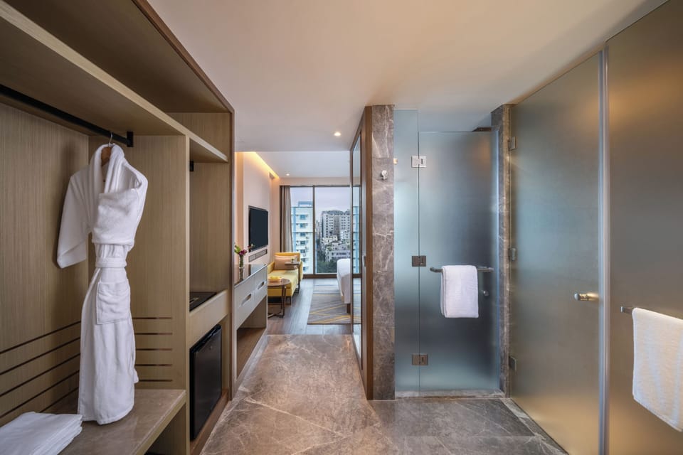 Junior Suite | Minibar, in-room safe, iron/ironing board, free WiFi