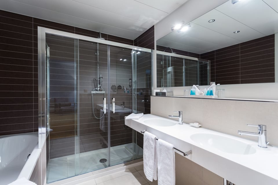 Shower, free toiletries, hair dryer, slippers