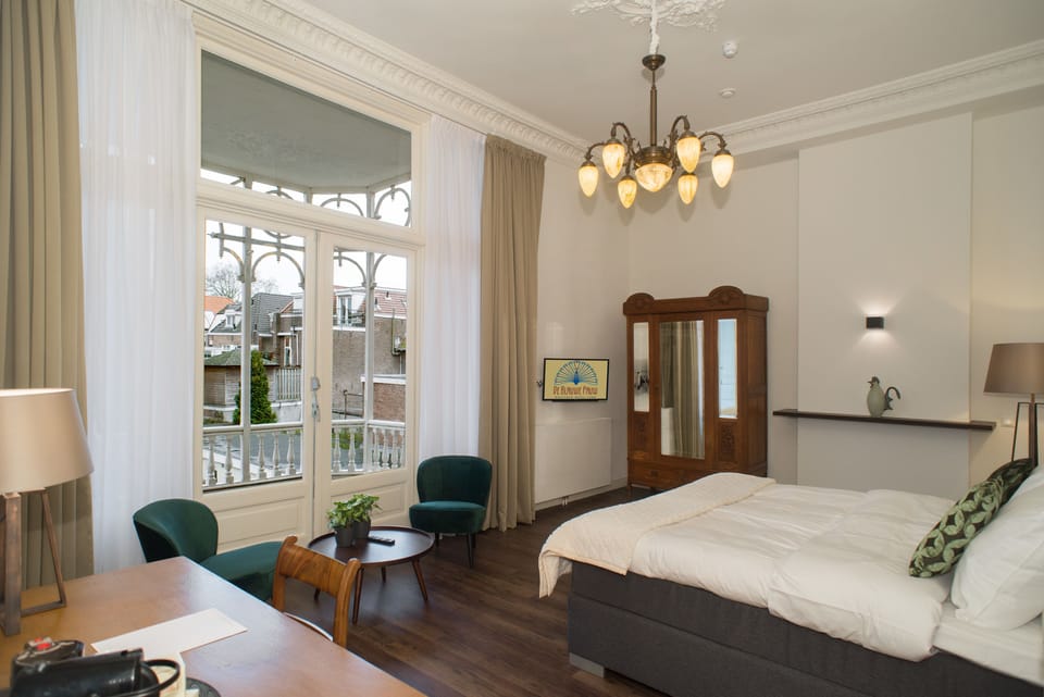Deluxe Double Room, 2 Bedrooms, Balcony, Garden View | In-room safe, desk, iron/ironing board, cribs (free)