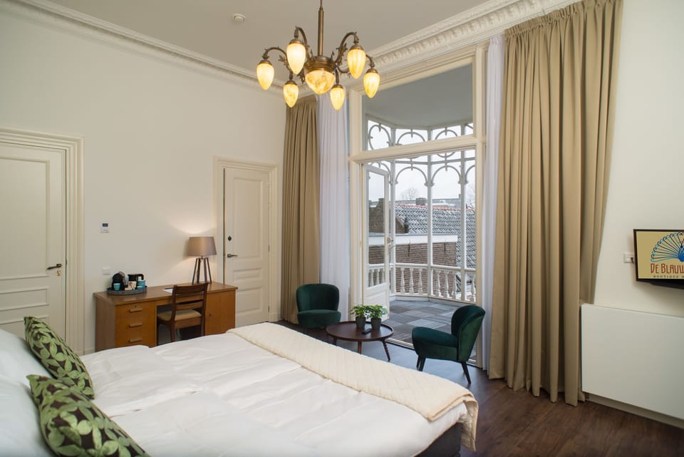 Deluxe Double Room, 2 Bedrooms, Balcony, Garden View | In-room safe, desk, iron/ironing board, cribs (free)