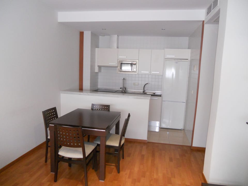Fridge, microwave, cookware/dishes/utensils