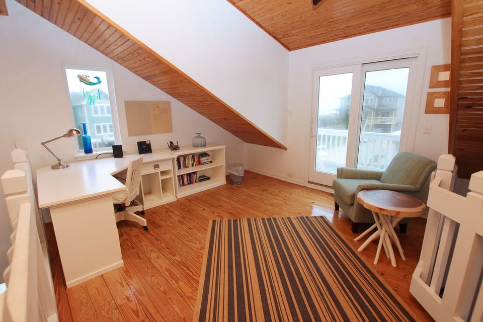 Loft.  Perfect for reading a book. Or watching the ocean. 