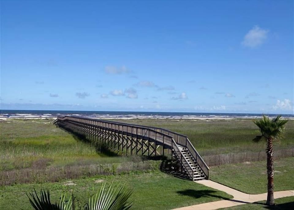 Dune crossover to the beach just steps away.