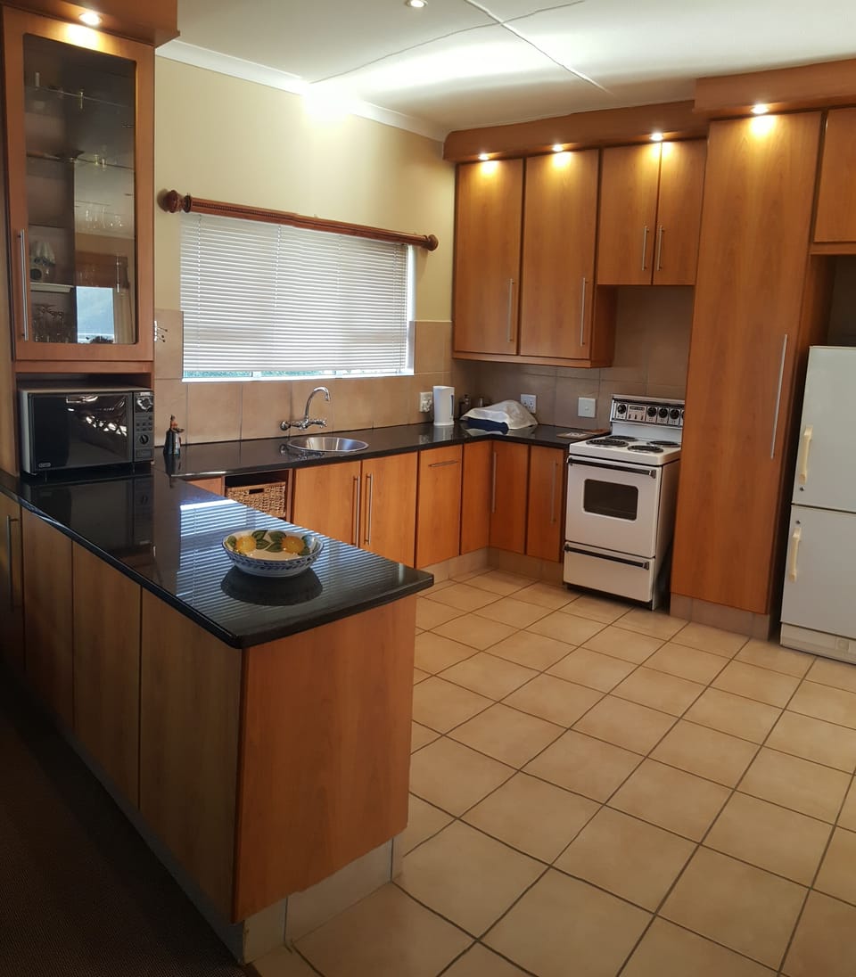 At 29 Columba, 4 Bedroom House | Shared kitchen | Fridge, microwave, oven, stovetop