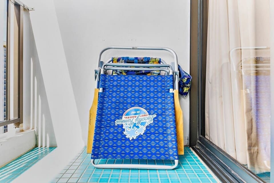 Two beach chairs are provided for use