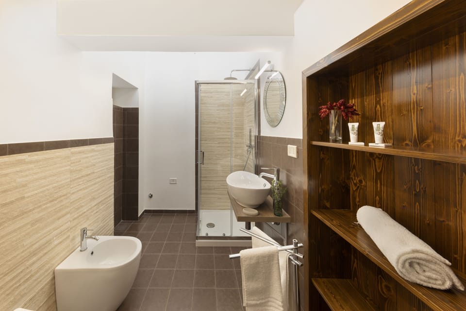 Family Room, Patio | Bathroom | Shower, free toiletries, hair dryer, bidet