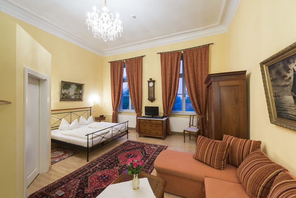 Double Room | Minibar, desk, iron/ironing board, free cribs/infant beds