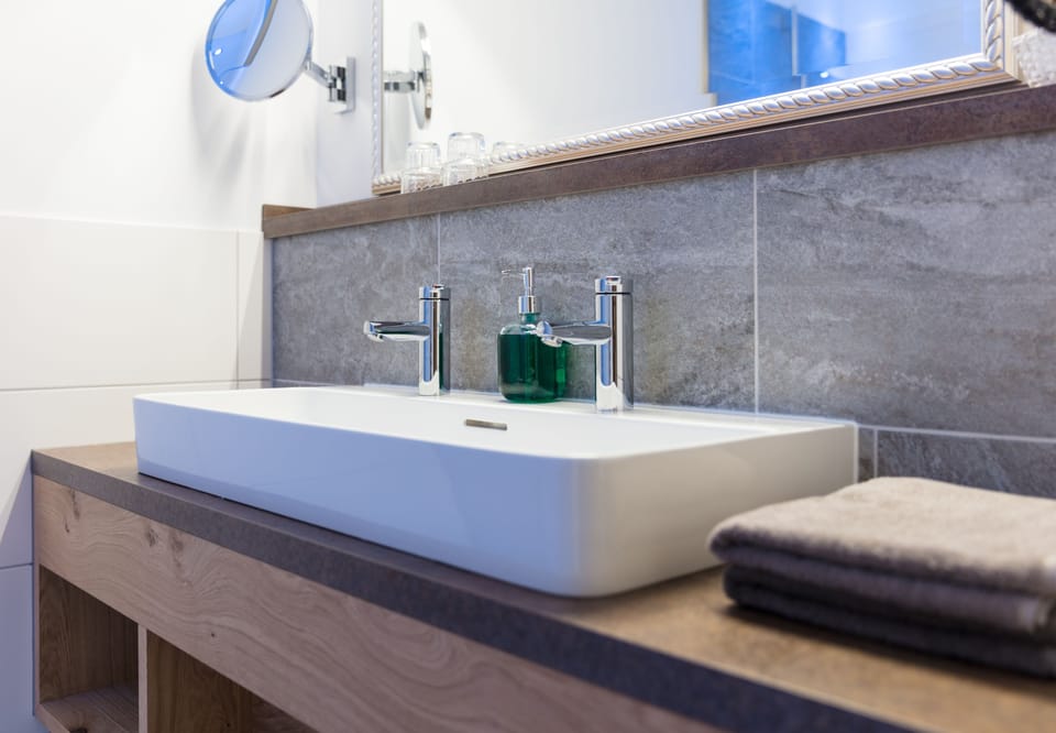 Shower, free toiletries, hair dryer, slippers