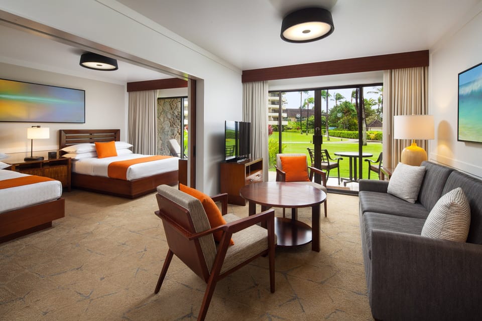 Ohana Suite Ocean View 2 Double + Murphy/Wall Bed | Living room | 50-inch LCD TV with cable channels, TV, foosball